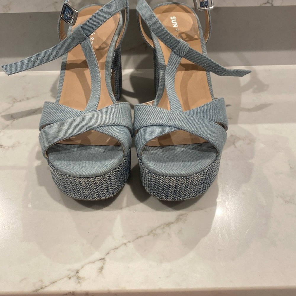 Sun and Stone denim platform heels with t-strap design